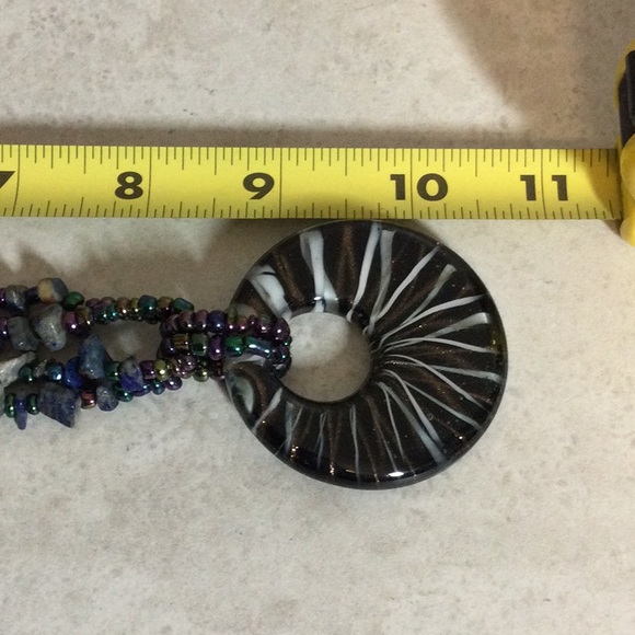 Iridescent bead necklace with Puka shells and  starburst pendant - Picture 7 of 7